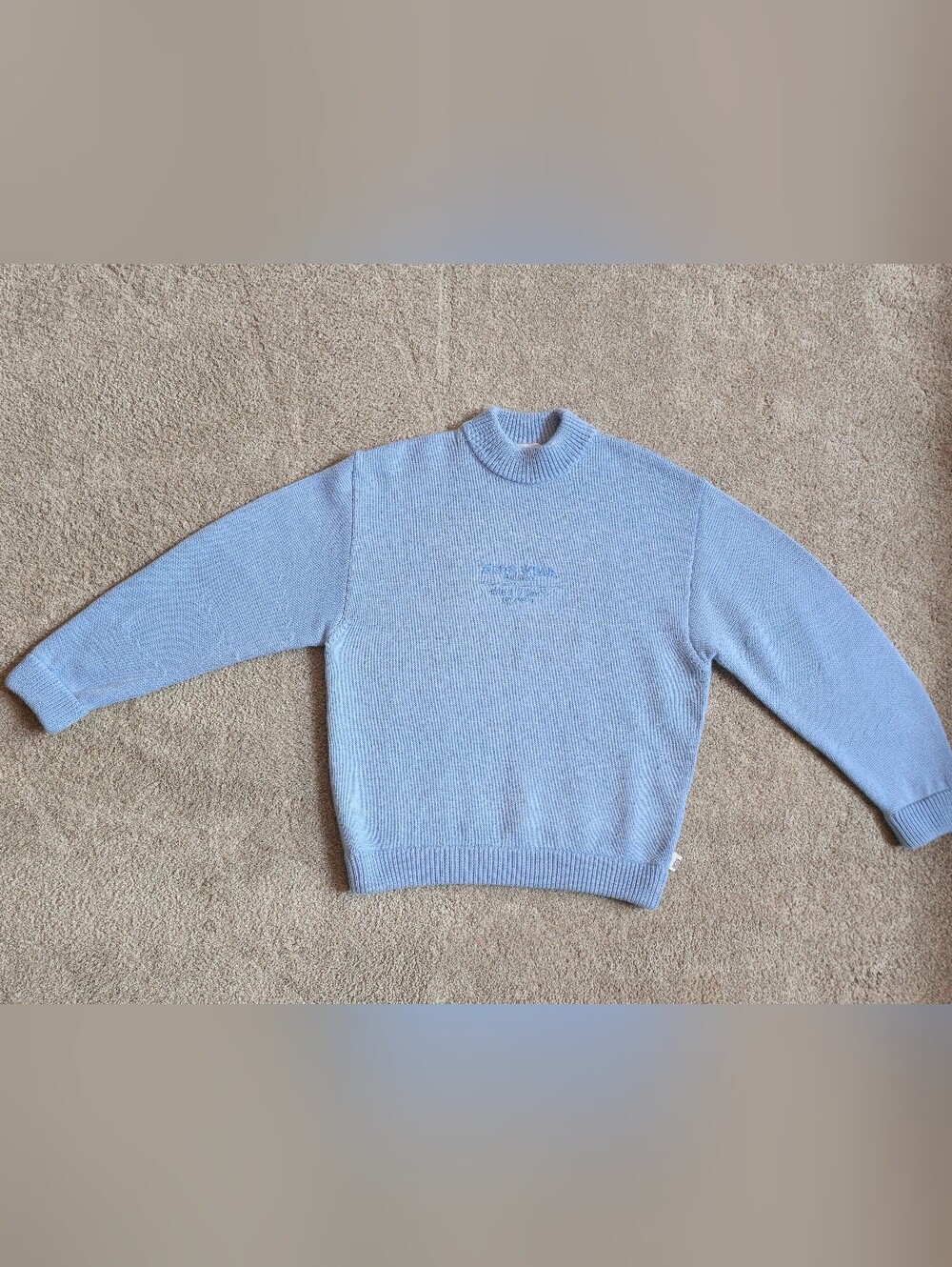 from GCDS is a rare or vintage find light baby blue mock-neck knit sweater